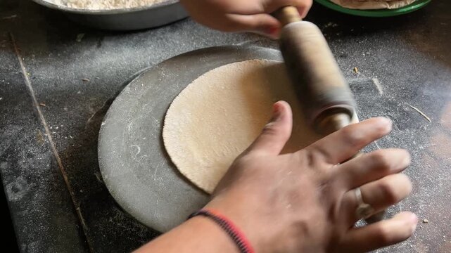 Making Roti on Chakla with Rolling Pin | Indian Woman Hands Rolling Dough for Traditional Flatbread