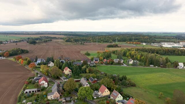 Aerial Freiberg Germany homes village pull. City center rural travel in eastern Germany. Historical buildings and landmarks. Urban historic center of East Germany. Total destruction in WW II.