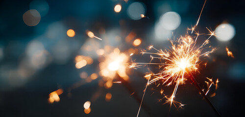 Obraz premium A close-up of sparklers creating a magical ambiance during a festive celebration or special occasion.
