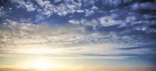 Radiant Sunrise with Dramatic Cloud Patterns in a Blue Sky, Illuminated Horizon, Bright Morning Light, Tranquil and Inspiring Natural Scene, Expansive Skyscape, Serene Outdoor Beauty, Peaceful Start

