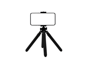 Small black tripod holding a smartphone with a blank white screen