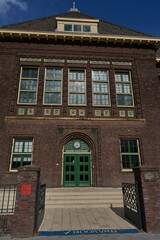 Enschede, Netherlands - August 29, 2025 - The Higher Textile School in Enschede is a part of Saxion University of Applied Sciences on a summer afternoon