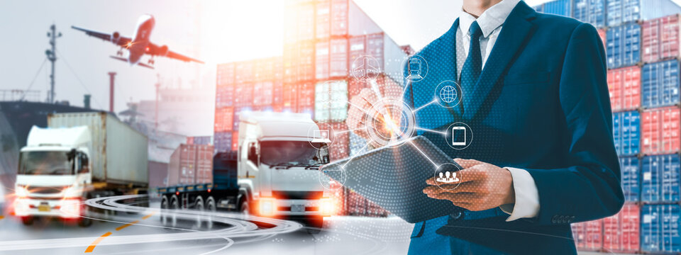 Global logistics management and digital transportation technology concept with business man using tablet, container ship, cargo truck, and airplane for worldwide delivery and supply chain.