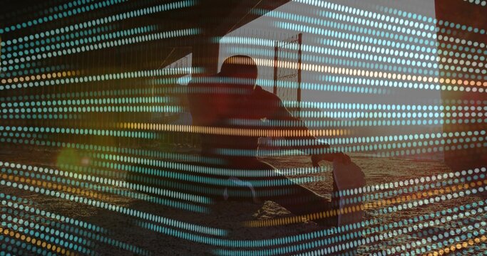 Crouching skateboarder beneath wooden pier columns on sandy seabed with teal gold dot overlay - Powered by Adobe