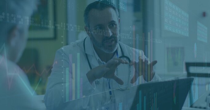 Discussing health data, doctor wearing white coat using laptop at clinic, stethoscope and overlays