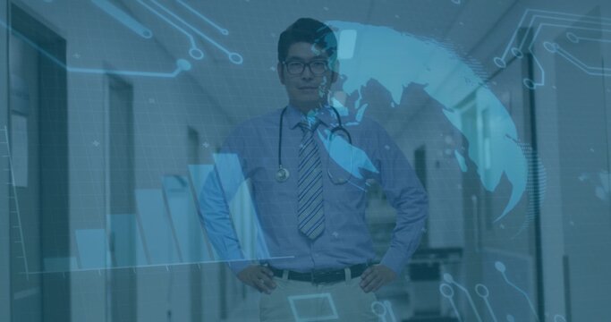 Standing mature doctor adjusting stethoscope in hospital corridor, with digital world map overlays