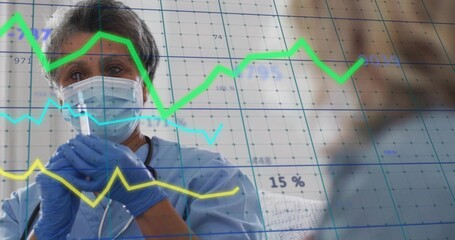 Analyzing trend lines, digital grid, nurse wearing scrubs, mask, gloves, stethoscope in clinic room