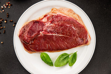 Duck breast raw poultry meat natural product tasty snack fresh delicious gourmet food background on the table rustic top view copy space