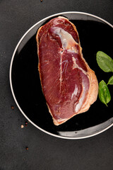 Duck breast raw poultry meat natural product tasty snack fresh delicious gourmet food background on the table rustic top view copy space