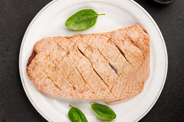 Duck breast raw poultry meat natural product tasty snack fresh delicious gourmet food background on the table rustic top view copy space