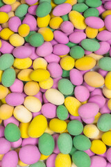 Group of colorful peanuts in glaze.