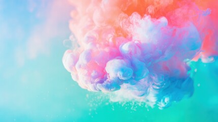 Obraz premium Colorful smoke cloud swirling above a soft blue background in a vibrant display