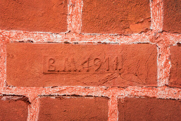 Stamp  on the brick of the stone wall of the monastery indicates that it is more than 100 years old. Letters "V M" mean - Valaam Monastery. Russia