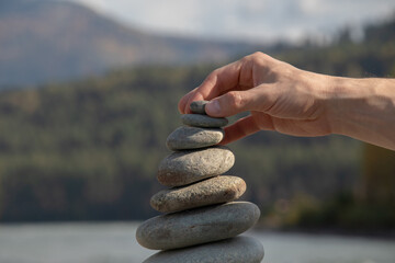 Balancing Stones with Hand