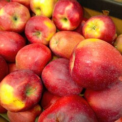 Background with red apples, fruit texture pattern