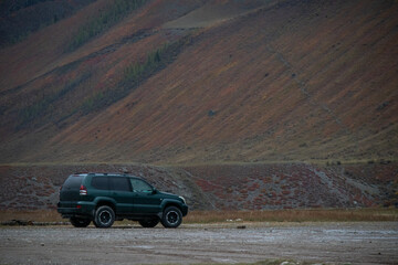 SUV in Mountain Landscape
