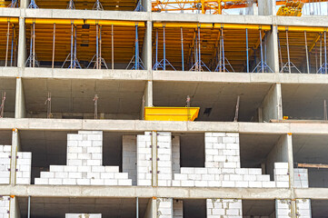 Construction of buildings using monolithic technology