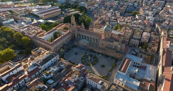 At sunset, aerial view of Palermo Cathedral. It is the cathedral church of the Roman Catholic Archdiocese of Palermo, located in Sicily, Italy. It is dedicated to the Assumption of the Virgin Mary.