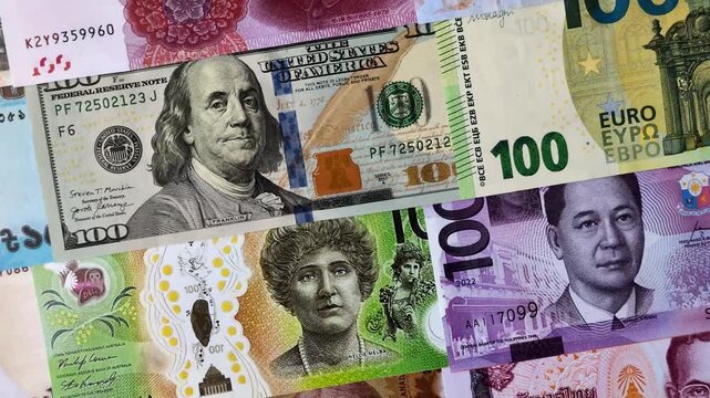 Paper money, banknotes of different countries as a business background. Paper money and cash