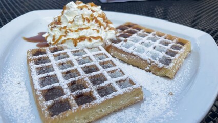 Belgian waffles with chocolate and cream