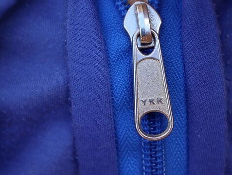 YKK zipper. YKK is a Japanese group of manufacturing companies. 