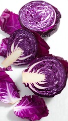 Freshly cut vibrant purple cabbage on a clean white background