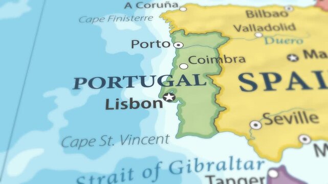 4K macro footage of Portugal on a world map with shallow depth of field. Focus on word Portugal and nearby regions. Travel geography footage