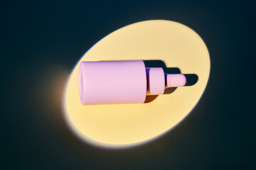 Bottles of facial serum on a golden background in the spotlight.