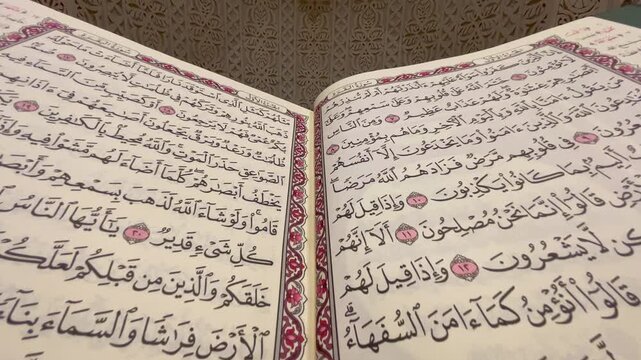Track-In Cinematic Shot of the Holy Quran Inside a Mosque - 4K