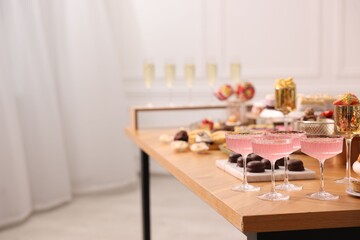 Buffet menu. Delicious desserts and drinks on table, selective focus. Space for text