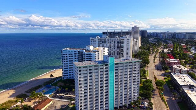 Condominiums on the beach. Aerial drone video Lauderdale by the Sea Galt Ocean Mile which is a area lined with highrise towers