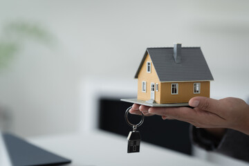 banker assesses home loan terms and contract finance in office