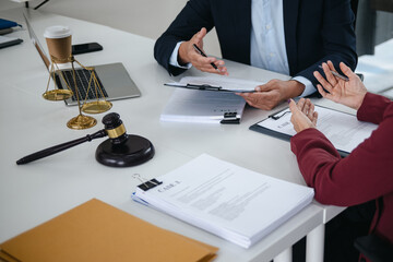 Lawyer discussing legal cases in law firm office
