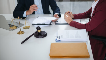 Attorney talking about legal cases in law firm office