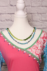 Vintage Beaded Shirt on Thrift Store Display