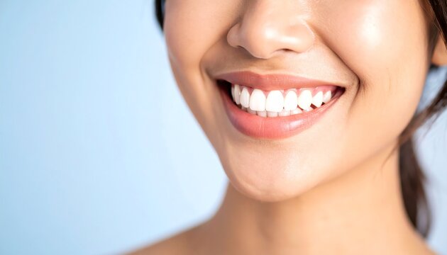 Happy woman displaying radiant smile after successful teeth whitening treatment and care session