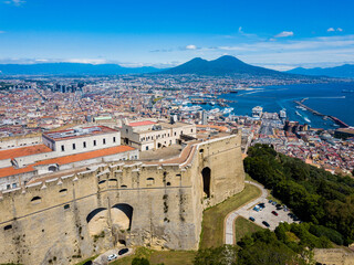 Naples, Italy - aerial view of the castle of San Telmo, the city and the volcano Vesuvius in the background