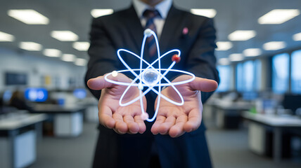 Dynamic business leader showcasing atom model representing scientific innovation and technological advancement in modern office setting for future growth