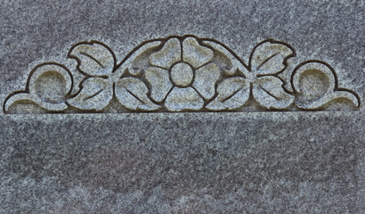 Close up of Historic Headstone With Floral Design in Rural East TX Cemetery