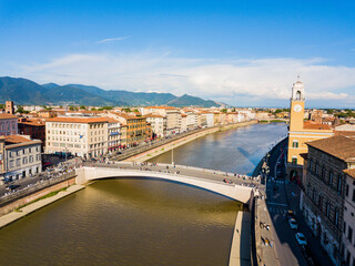 Pisa, Italy - aerial view of a bridge on the Arno River in the middle of the city