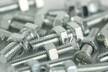 macro of a group of bolts and nuts