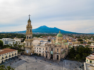 Pompeii, Italy - aerial view of the Sanctuary of Our Lady of the Rosary and Mount Vesuvius in the background