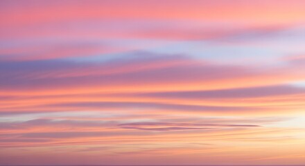 Fototapeta premium Soft pastel sunset sky with gentle horizontal hues of pink orange purple and yellow