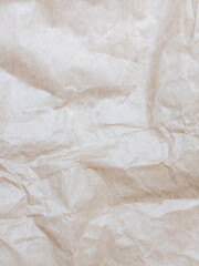 Crumpled brown kraft paper texture background