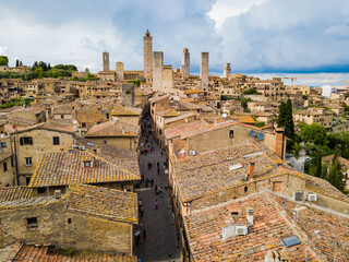 San Gimignano, Italy - aerial view of the main street of the medieval Tuscan town, famous for its towers