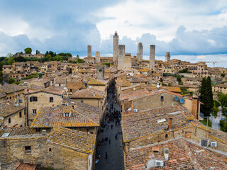 San Gimignano, Italy - aerial view of the main street of the medieval Tuscan town, famous for its towers