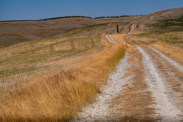 Winding Dirt Path through Dry Hills and Scenic Valley
