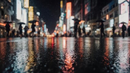 Obraz premium Rainy night in city; people walking, reflections in wet street, illuminated signs blur
