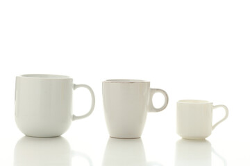 Beautiful White bright ceramic bowl and tarenes on the table. Clean crockery concept