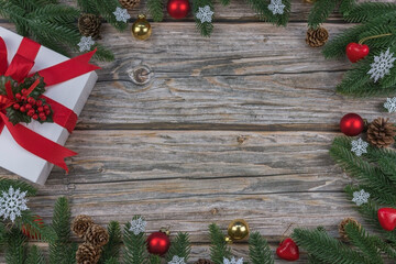 Christmas and New Year frame on wooden background with festive decorations and copy space